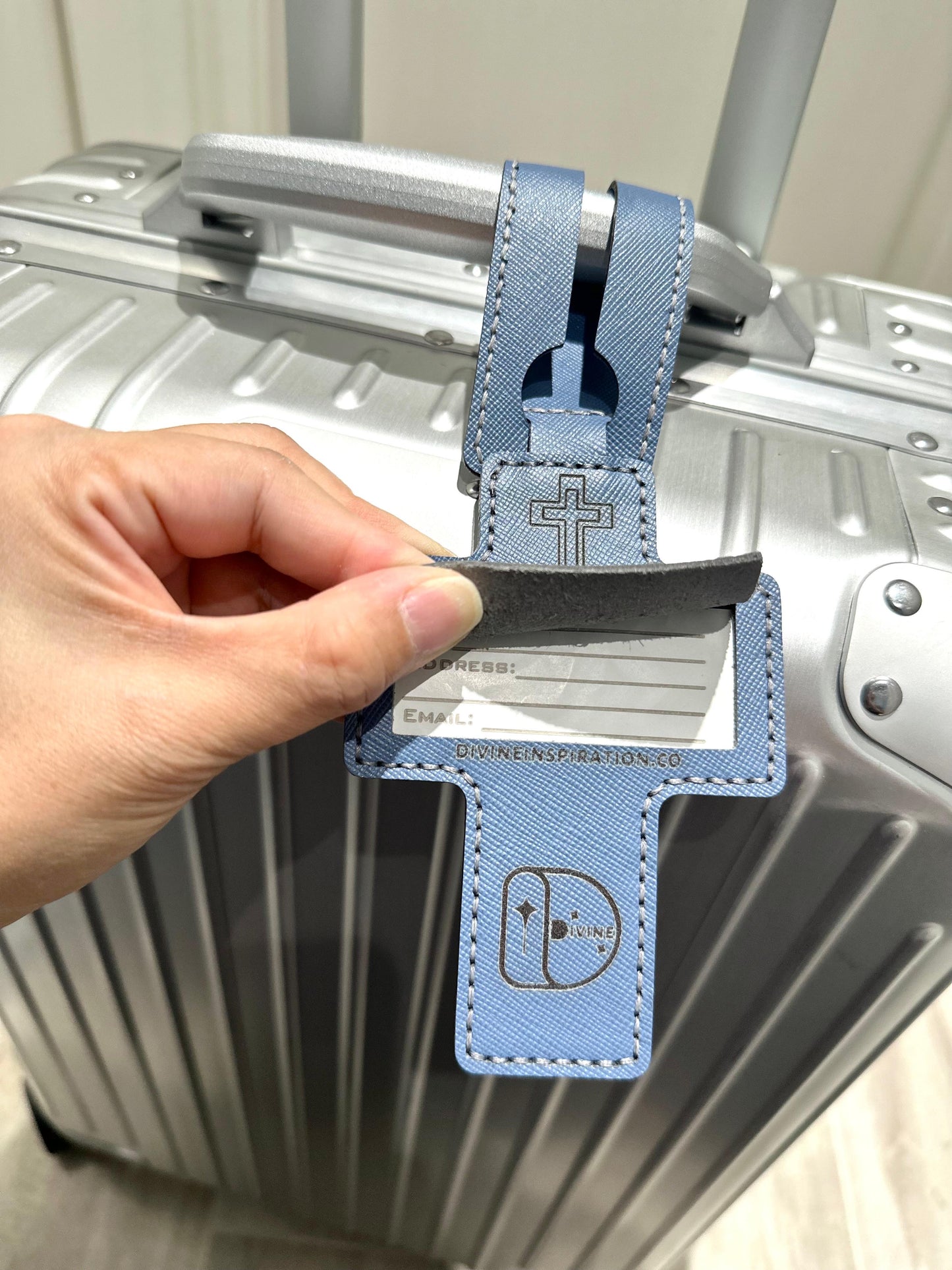 “Jesus loves you” leather luggage tag