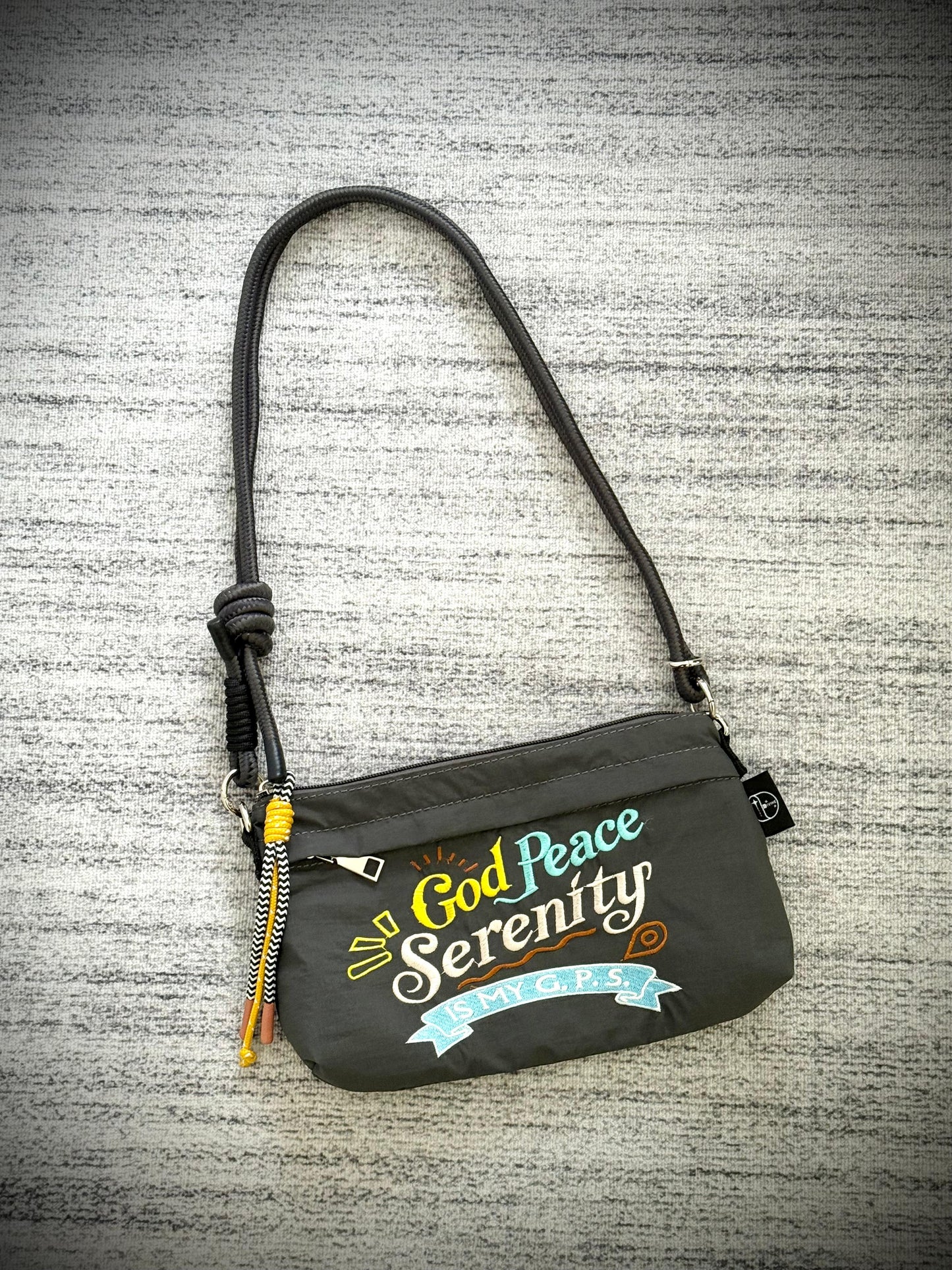 “God Peace Serenity is my G.P.S. “Small Handbag with embroidered calligraphy